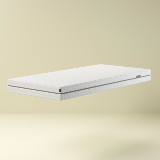 Flexa SLEEP Einzelmatratze mit hellgrauem Bezug vor neutralem Hintergrund.