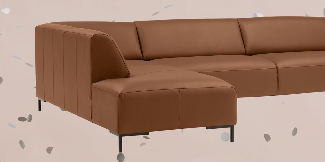 BROSCH Sofa mit Konfetti auf beigem Hintergrund